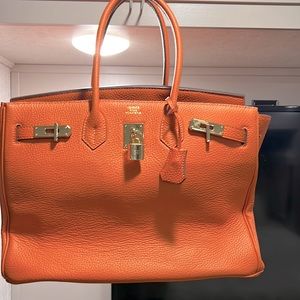 Nice leather handbag, orange nice for the spring!